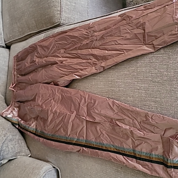 Pants they are brand new, rose color with stripes down the side. - Picture 2 of 10